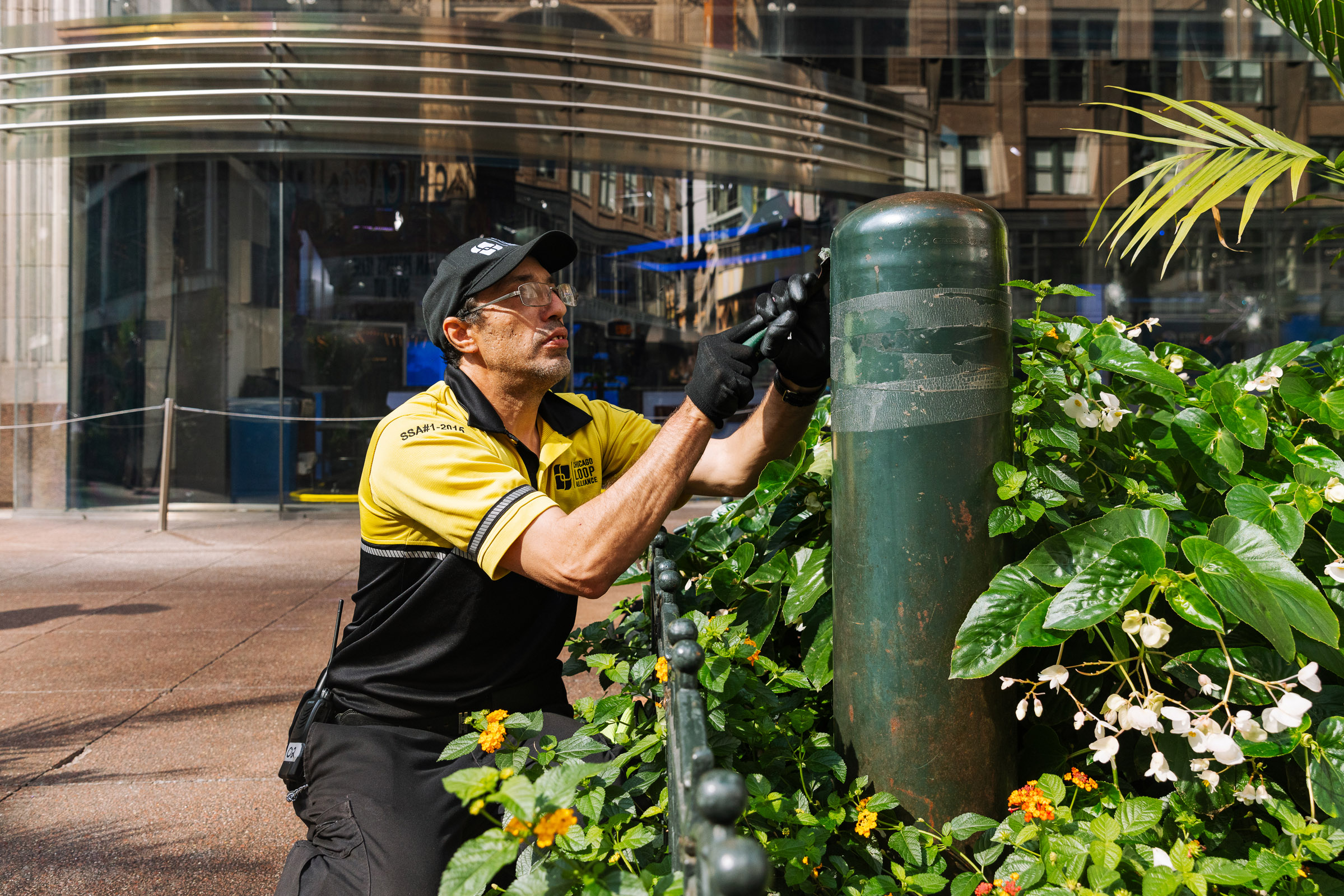 Chicago Loop Alliance Clean Team Ambassador cleaning stickers - photo by Faith Decker