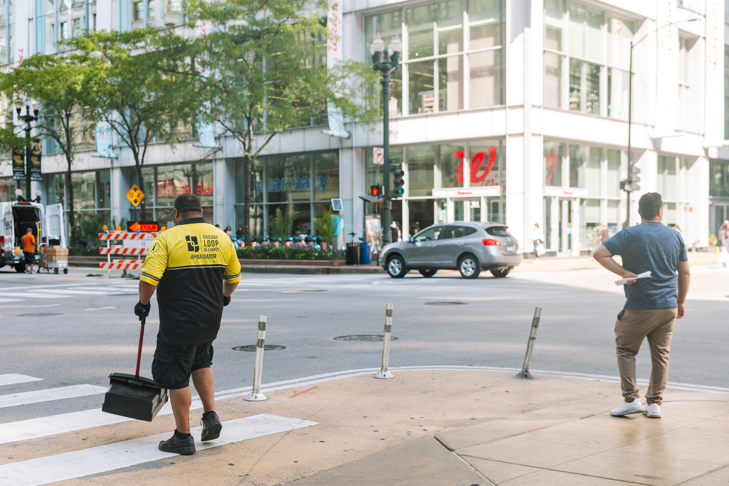 Chicago Loop Alliance Street Team Ambassador sweeping - photo by Faith Decker