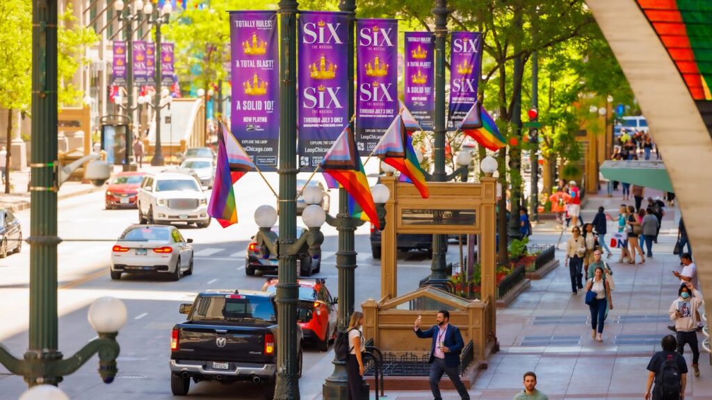 Chicago Loop Alliance honors Juneteenth and Pride Month with flag display on State Street